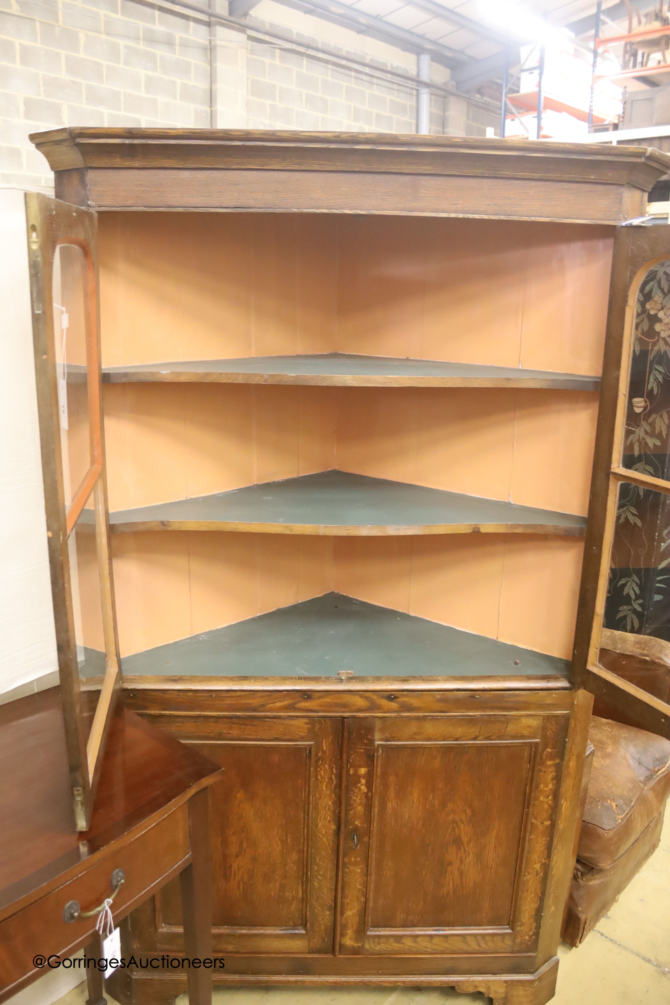 A 19th century oak standing corner cupboard, length 112cm, depth 51cm, height 190cm